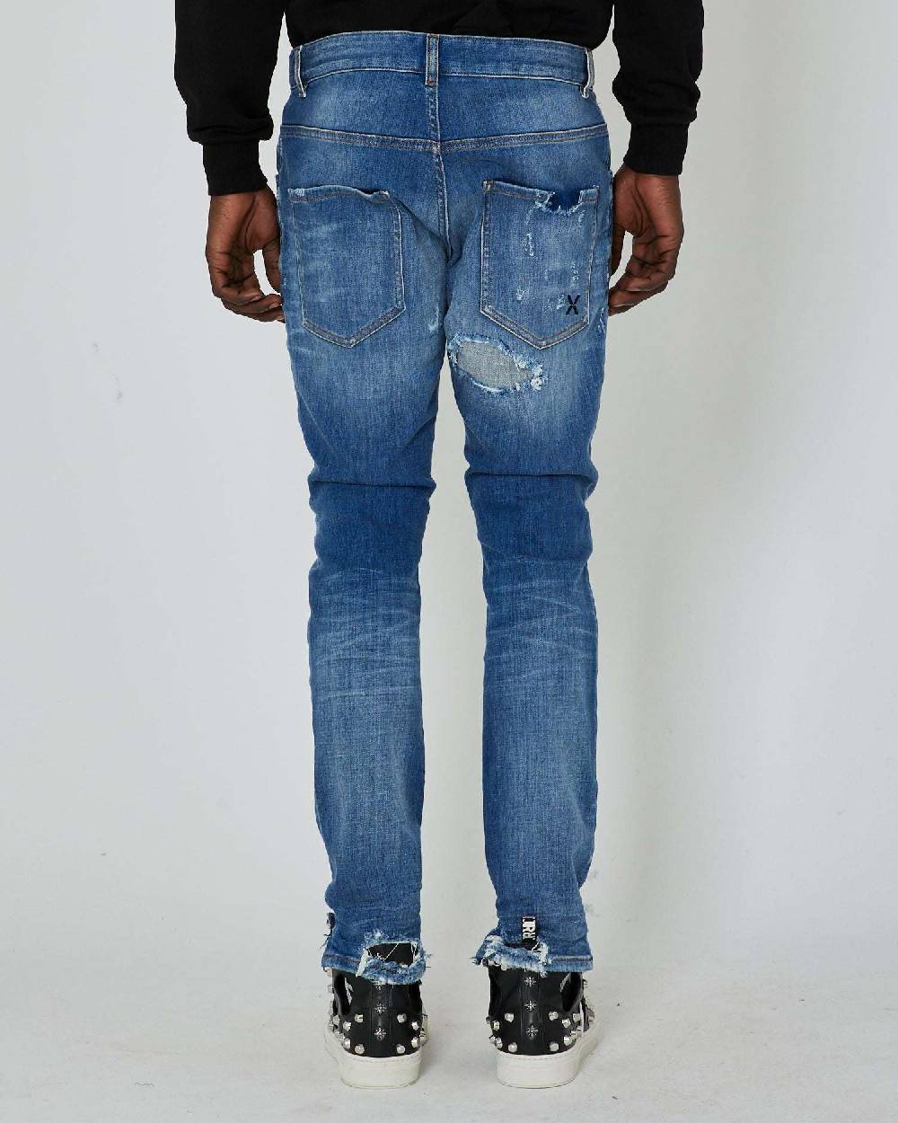 John Richmond Jeans slim con strappi sul davanti Qualità Garantita