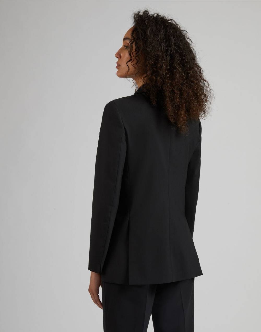 Lardini Blazer doppiopetto nero in tela di lana stretch In Vendita