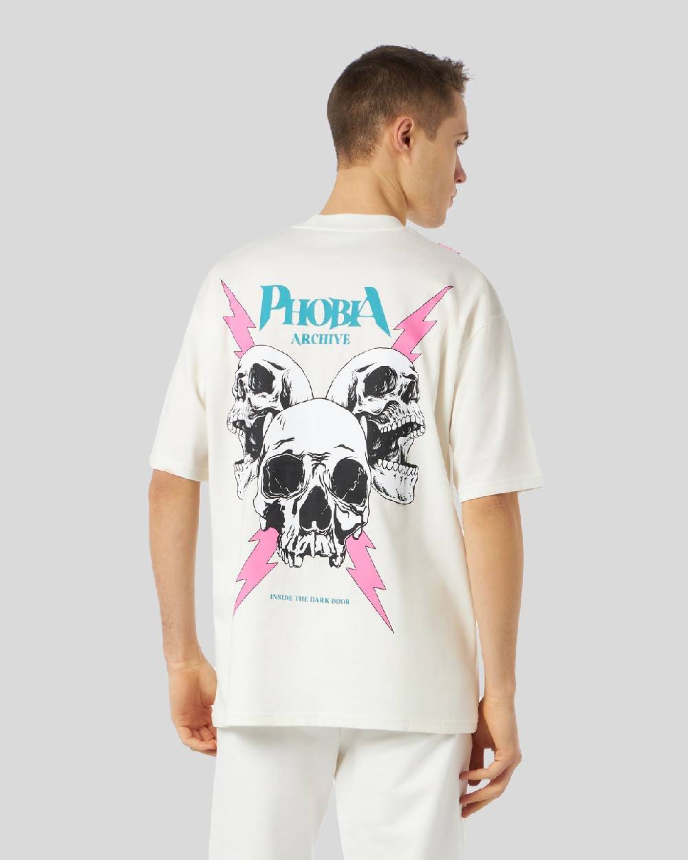 Phobia Archive T-SHIRT BIANCA CON GRAFICA SCREAMING SKULLS ROSA Italy