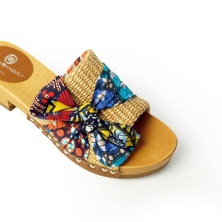 Roberta Gandolfi Lola Sabot sandali in legno con rafia e pelle di vitello con fiocco stampa african Vendita Economica