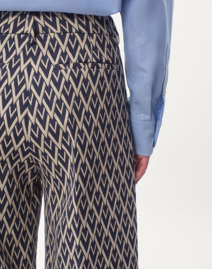 Valentino Handbags Pantalone In Lana Con Risvolto Con Motivo Jacquard Toute La V per Uomo in Notte/crema | Valentino IT Qualità Garantita