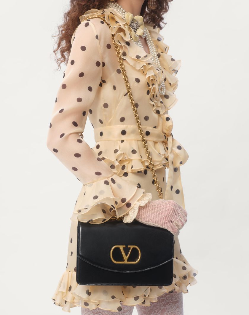 Valentino Handbags Abito Corto In Organza Stampa Pois Spots per Donna in Avorio/nero | Valentino IT 2025