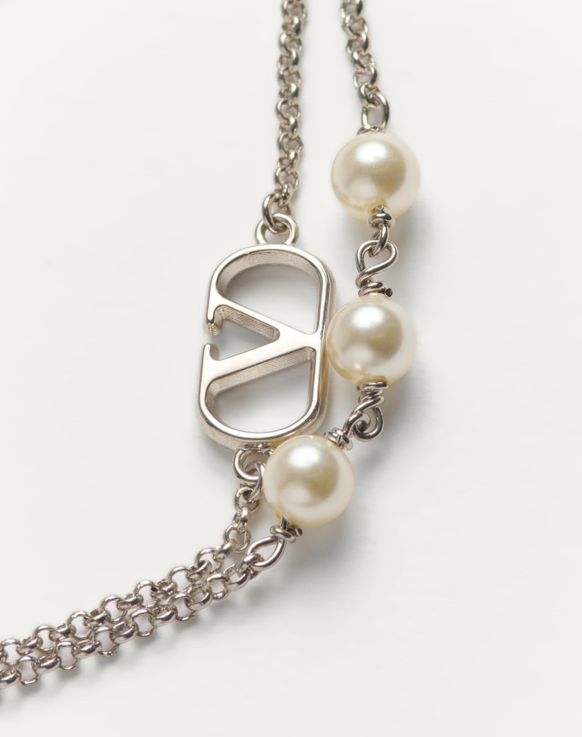 Valentino Handbags Bracciale Vlogo Signature In Metallo E Perle Swarovski® per Donna in Palladio/crystal | Valentino IT Fino al 60% di sconto